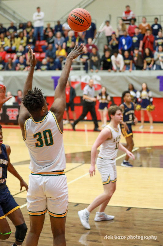 jonathan alexandre takes a shot for legacy during the basketball state championship